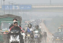 Delhi Chokes Under Summer Dust