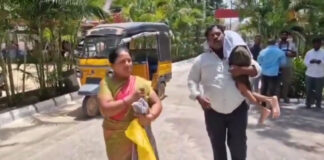పెన్షన్ కోసం బిడ్డను భుజాన మోసుకుని కలెక్టరేట్కు.|