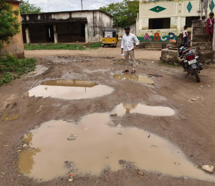 Waterlogged streets near Gandhi School in Asifabad municipality causing inconvenience to students and residents.