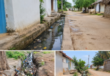 A serious drainage problem is affecting the local area. Drainage water is overflowing onto the roads. Several drainage outlets are blocked with waste. Dirty water is accumulating near houses and shops.